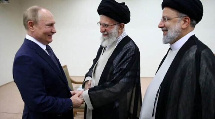 Supreme Leader Ayatollah Ali Khamenei, center, and Russian President Vladimir Putin, left, greet each other as Iranian President Ebrahim Raisi stands at right, during their meeting in Tehran, Iran, July 19, 2022. (Office of the Iranian Supreme Leader via AP)