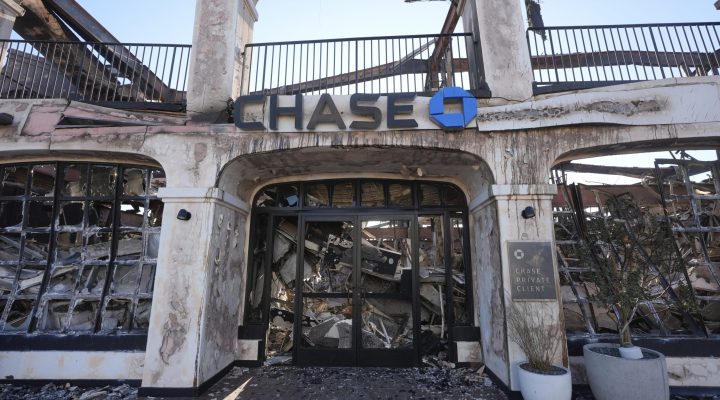 A Chase Bank branch destroyed by the Palisades Fire is seen in the Pacific Palisades neighborhood of Los Angeles, Monday, Jan. 13, 2025. (AP Photo/Richard Vogel)