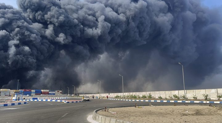 In this photo provided by Iranian Students' News Agency, ISNA, a black smoke rises in the sky after a massive explosion rocked a port near the southern port city of Bandar Abbas, Iran, Saturday, April 26, 2025. (Razieh Pudat/ISNA via AP)