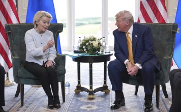 President Donald Trump and European Commission President Ursula von der Leyen speak as they meet at the Trump Turnberry golf course in Turnberry, Scotland Sunday, July 27, 2025. (AP Photo/Jacquelyn Martin)