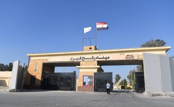 The flag of Egypt sways in the wind on the Egyptian side of the Rafah border crossing with the Gaza Strip on September 9, 2024. (Photo by AFP)