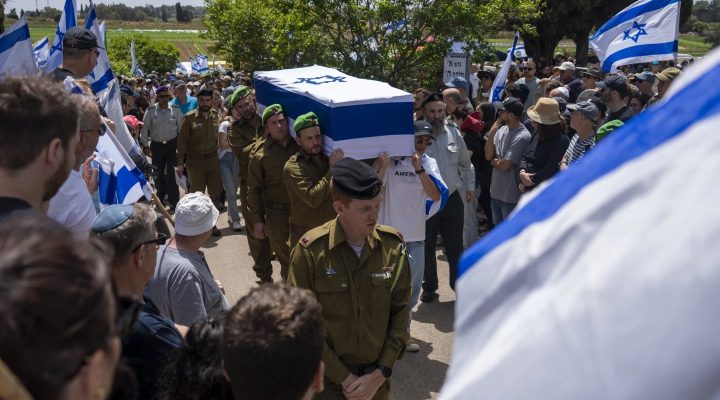 Israeli soldiers carry the casket of Israeli reserve Major Dor Zimel during his funeral in Even Yehuda, Israel, Monday, April 22, 2024. Zimel, 27, died of his wounds after the Iran-backed Lebanese Hezbollah terror group fired a volley of rockets and drones on northern Israel. In mid-May 2024, Hezbollah has used a drone equipped with missiles to attack an Israeli post as well as an explosive drone to hit its deepest target so far since the clashes began seven months ago. (AP Photo/Ariel Schalit, File