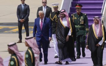 President Donald Trump walks with Saudi Crown Prince Mohammed bin Salman during an arrival ceremony at the Royal Terminal of King Khalid International Airport in Riyadh, Saudi Arabia, Tuesday, May 13, 2025. (AP/Alex Brandon)