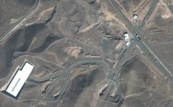 This satellite image provided by Maxar Technologies shows vehicles at the Fordo enrichment facility in Iran on Friday, June 20, 2025. (Maxar Technologies via AP)