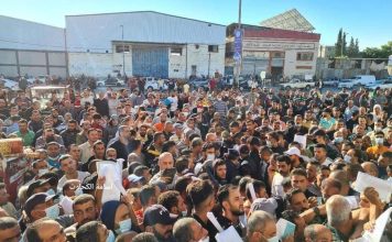 A portentous photo of a mob of Gazans waiting in front of the Chamber of Commerce in Gaza in 2022 after Israel lifted a 15-year ban and increased the number of Gazans allowed to work in Israel.